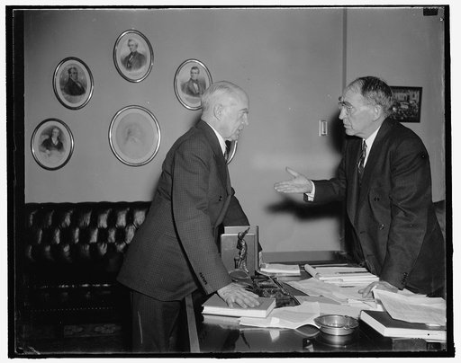 Washington, D.C., Jan. 10. Rep. Hatton W. Sumners, Democrat of Texas, who is being mentioned as a probable candidate to succeed Justice George Sutherland on the United States Supreme Court, is shown talking with Speaker Bankhead, 1/10/38
