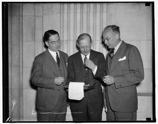 Textile experts before senate committee. Washington, D.C., Jan. 10. The above textile experts were called before the Special Senate Committee investigating unemployment today. They are, left to right: Russell Fisher, President, American Cotton Manufacturers; Robert E. Henry, President, Southern Text