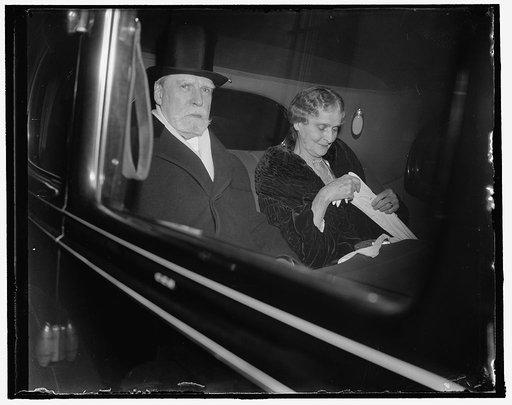 White House reception for Judiciary. Washington, D.C., Jan. 11. The Chief Justice of the Supreme Court Charles Evans Hughes and Mrs. Hughes are shown as they left their residence for the White House reception for the Supreme Court and the Judiciary, 1/11/38