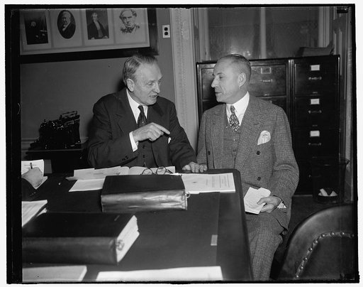 Plan for hearing on Reed nomination. Washington, D.C., Jan. 17. Senator Henry F. Ashurst, of Arizona, Chairman of the Senate Judiciary Committee, and Senator Matthew M. Neely of West Virginia, Senate Rules Committee Chairman, map out plans for Senate Judiciary Subcommittee hearing on the fitness of 