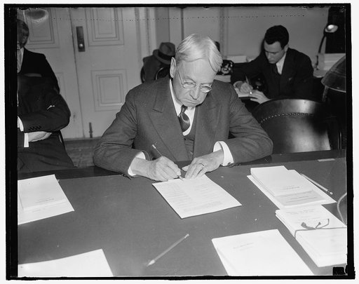 California's veteran republican senator. Washington, D.C., Jan. 19. Senator Hiram W. Johnson, veteran republican legislator from California, pictured in a series of poses while he listened to testimony before the Senate Commerce Committee now investigating the country's maritime industry. Senator Jo