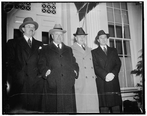Left to right: Ernest Kanzler, Universal Credit Co.; Henry Ittleson, Commercial Investment Trust; Senator Prentiss Brown, of Mich.; Edsel Ford, Auto Conference at White House