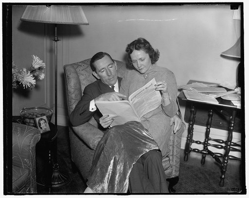 No rest for a weary filibuster. Washington, D.C., Jan. 27. Senator Claude A. Pepper, Democrat of Florida who spoke for 11 hours during the current filibuster against the Anti-lynching bill, points out to pretty Mrs. Pepper the interesting sections of his long winded talk as he printed in the Congres