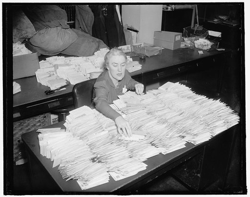 Dimes for Infantile Paralysis Foundation flow into White House for president. Washington, D.C., Jan. 28. Official mail was nearly forgotten today at the White House as letters containing ten-cent contributions to the National Foundation for Infantile Paralysis continued to arrive by the thousands. M