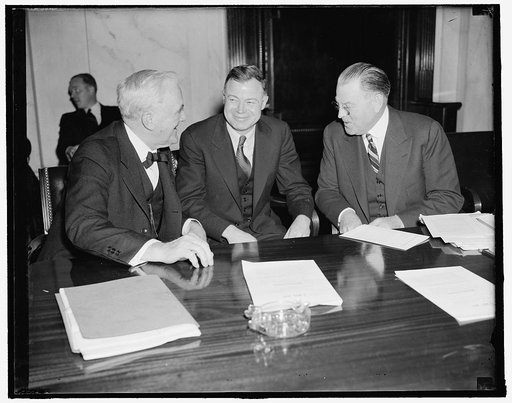 Republican Senators question NLRB Head. Washington, D.C., Feb. 3. Republican Senators George W. Norris (left) of Nebraska, and Warren R. Austin of Vermont, instill a bit of good-natured joshing into their questioning of Chairman J. Warren Madden of the National Labor Relations Board, before the Sena