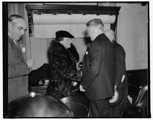 Sec. of Labor before senate committee. Washington, D.C., Feb. 4. Secretary of Labor Frances Perkins greets Senator Royal S. Copeland, D. of New York, Chairman of the Senate Commerce Committee, where in a statement to the committee she opposed the labor provisions of the pending Maritime Bill, the bi