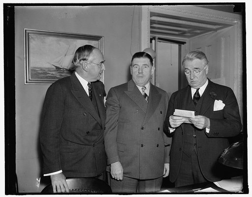 Communists filtering into Merchant Marine Union head charges. Washington, D.C., Feb. 9. Appearing before the Senate Commerce Committee today, Joseph P. Ryan, (center) President of the International Longshoremen's Association, an A.F. of L. affiliate, charged "Communism" to CIO Labor Leaders and inco