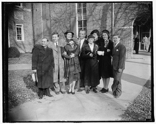 New Jersey senator weds in Virginia. Fairfax Courthouse, Va. Feb. 9. United States Senator William H. Smathers of New Jersey, with his bride the former Mary James Foley of Berryville, Va., are shown with a group of relatives and friends who witnessed the ceremony today in the historic courthouse her