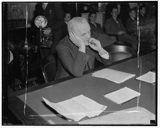 Nebraska senator studies answers. Washington, D.C., Feb. 10. Senator George W. Norris, veteran republican from Nebraska, listens intently to the answers of Robert H. Jackson, nominee for Solicitor General, as he questioned by a Senate Judiciary Subcommittee, 2/10/38