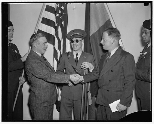 Communists get together. Washington, D.C., Feb. 12. Americans, all of whom fought and many wounded while fighting for the Loyalists in Spain, met today in Washington at the First National Conference of the Veterans of the Abraham Lincoln Brigade, left to right: Francis J. Gorman, President of the Un