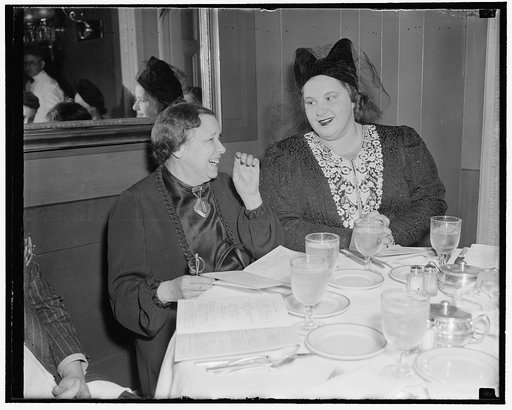 Songbird of the South has lunch at the Capitol. Washington, D.C., Feb. 15. Sen. Hattie Caraway, of [...], photographed while having luncheon with [...]te Smith, radio star at the Capitol restaurant today, 2/15/38