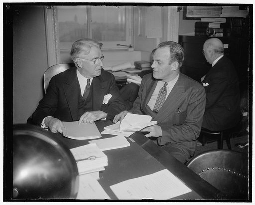 NMU head denies he's a communist. Washington, D.C., Feb. 17. Joseph Curran, President of the National Maritime Union, today told the Senate Commerce Committee that "I have not been a Communist, I am not a Communist and I do not believe that I ever intend to be a Communist." Curran, (right) shown wit