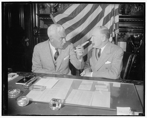 McNutt talks, Woodring listens. Washington, D.C., Feb. 23. Paul V. McNutt, High Commissioner to the Philippines who arrived in Washington today to make an official report, conferred at length with Secretary of War Harry H. Woodring this morning. Following the meeting both declined to comment on the 