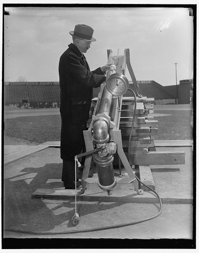 Baseballs undergo outdoor tryout. Washington, D.C., Mar. 7. The government's test for velocity of the American and National League baseballs went out in the open air today, having learned all about the traits of the pellets within the laboratory. The Bureau of Standards transported it's paraphernali