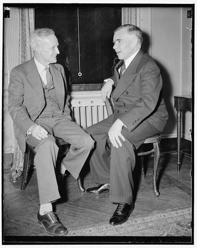 Lowell Mellett, left, & Troyawovsky