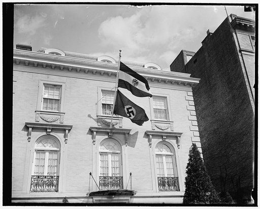Nazi flag flies from Austrian Legation. Washington, D.C., Mar. 12. As soon as German troops crossed the border into Austria, the Austrian Legation in Washington, represented by Minster Edgar L.G. Prochnick, received orders from the Foreign Office in Vienna to fly the Swastika flag, 3/12/38
