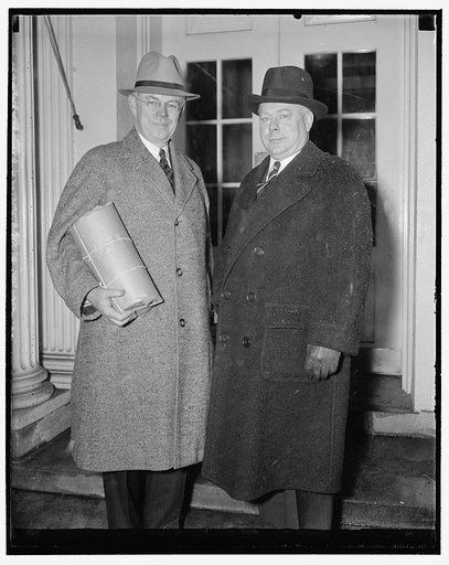 Sen. F. Ryan Duffy (with cheese) and George L. Mooney, Secty, Nat'l Cheese Inst., Plymouth, Wisc., present cheese to Roosevelt, 3/5/38