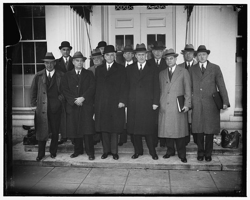 Railroad parley at White House. Washington, D.C., March 15. Representatives of Railroad Management, Labor and Government officials and Congress met with President Roosevelt today in efforts to find a remedy to aid the Nation's financially distressed railroads. In the front row, left to right: ICC Co