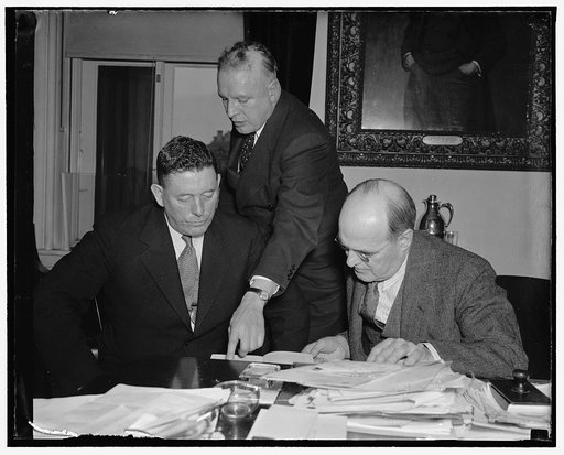 Closer U.S.-Canada Marihuana (Marijuana) control discussed. Washington, D.C., March 24. Closer cooperation in the control of the use of marihuana weed is expected to be the outcome of a meeting today between the Canadian Narcotic Control Chief and U.S. Treasury officials. In the photograph, left to 