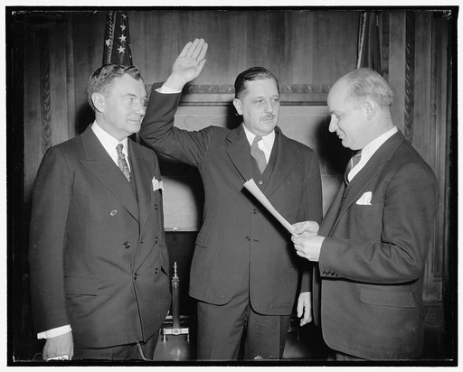 Thurman Arnold. L.R. Robert Jackson, Solicitor Gen'l; Thurman Arnold, Asst. Sol. Gen'l; Hugo Carsui, administering oath being sworn in