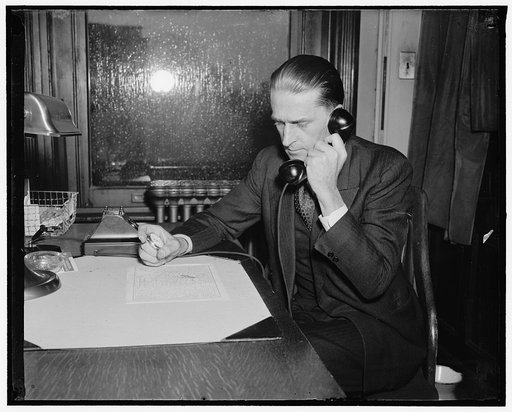 Add automatic river gauge. After dialing the Potomac River Gauge, A.L. King, U.S. Weather Bureau observer, waits for the first buzz, then sets his stop watch which continues until the buzz signal is again heard then he stops the watch. The time interval between the two signals is converted into the 