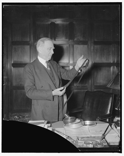 Sec. of Commerce Daniel Roper, with movie strip of the San Francisco Exposition