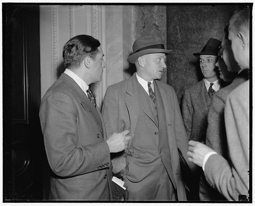 Dave Schenker, with William O. Douglas, Chairman of S.E.C. at appropriations hearing at Cap.