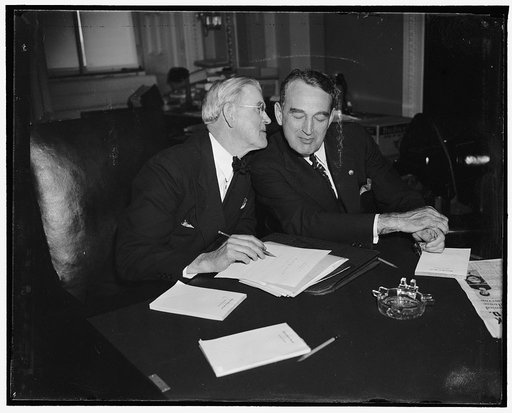 Chairman of congressional TVA investigating committee. Washington, D.C., April 27. Following the first meeting of their Committee today, Senator Vic Donahey (Left) and Rep. James M. Mead, Co-Chairman of the Congressional Investigators, went into a huddle to map plans for the open hearings which will