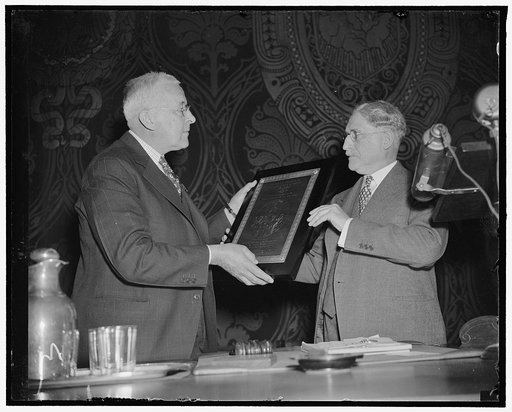 Boston gets U.S. Chamber of Commerce award for health conservation. Washington, D.C., May 2. Boston, Mass., was given the United States Chamber of Commerce Award today for the best accomplishment in health conservation in cities over 500,000 population. Dr. H.F. R. Watts, (left) Boston Health Commis