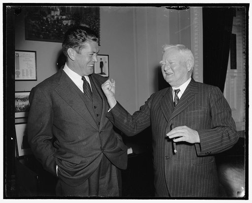 Vice President displays "right" to former champion. Washington, D.C., May 3. Vice President Garner displays his powerful "right" to Gene Tunney during an impromptu visit of the former heavyweight champion at the Capitol today. Tunney was in Washington to discuss liquor taxes with Secretary of the Tr