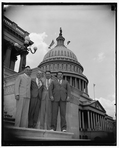 Left to right: Rep. Frank Carlson, R. of Kansas; Sen. Ernest Lundeen, FL of Minn.; Sen. Edwin C. Johnson, D. of Colo.; Rep. Dewey Johnson, FL of Minn. Swedish descent members of Congress who are assisting in celebration of the 4th of July in Sweden