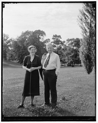 Sec. Ickes shows bride new home. Olney, MD. June 22. Immediately after arriving at his country home "Headwaters" here with his bride of a few weeks, Secretary of Interior Harold Ickes shed his coat and took the hew Mrs. Ickes for a tour of the estate, 6/22/38