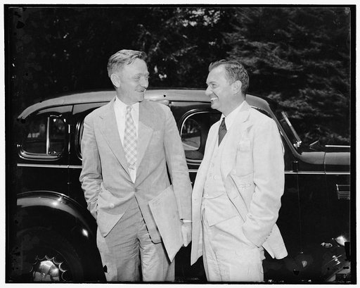Confer with President on anti-trust matters. Washington, D.C., June 24. William O. Douglas, Chairman of the Securities and Exchange Commission. Left; and Robert Jackson, Solicitor General, photographed after leaving the White House today where they conferred with the President on anti-trust matters,