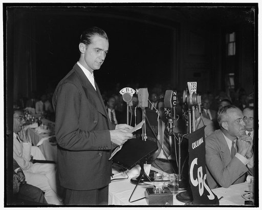 Howard Hughes speaking before the Press Club. Washington, D.C., July 21. Howard Hughes, speaking at the National Press Club today, before hundreds of government officials and representatives of foreign governments. Hughes today envisioned a future in aviation when giant flying boats, almost as large