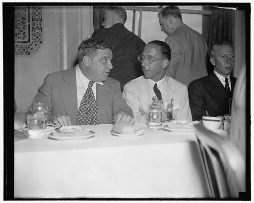 Talking the Italian situation over. Washington, D.C., July 21. Italy's highest ranking citizen in the United States and New York City's Mayor of [...] together while attending the Press Club luncheon for Howard Hughes, Mayor Fiorello LaGuardia of New York, left and Ambassador Fulvio Suvich, talking 