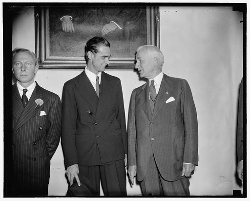 L to R: Howard Hughes & Sec'y Hull