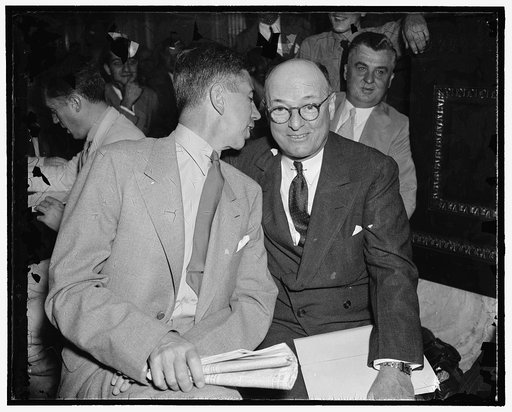 Last minute advice. Washington, D.C., Aug. 11. Tom M. Girdler; Republic Steel Board Chairman, took the last minute advice of Charles M. White (left) Vice President of Republic, with a smile today just before he was questioned by the Senate Civil Liberties Committee, 8/11/38