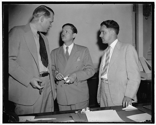 Brothers first witnesses before Congressional Committee investigating un-American activities. Washington, D.C., Aug. 12. Two brothers of Chicago, James J. (right) and John Metcalfe, (center) first witnesses before the Special House Committee investigating Un-American activities, are pictured with Re