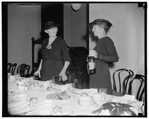 Mrs. Elmer Thomas, wife of the Senator from Okla. and Mrs. Burton K. Wheeler, wife of the Senator from Montana, pour water for the Senate Ladies Luncheon Clu