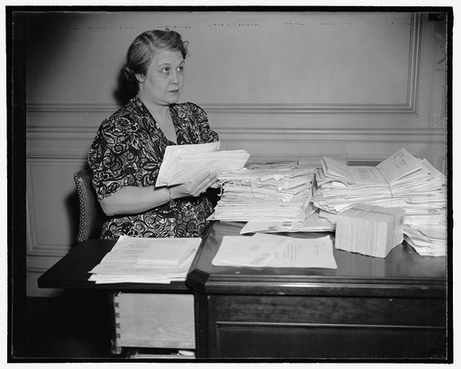 Mrs. Elmer Andrews, wife of the Wage Hour Administrator with hundreds of letters asking for jobs
