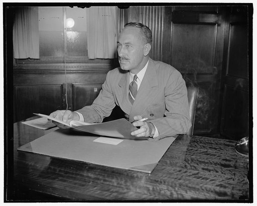 Members of new Air Safety Board. Washington, D.C., Aug. 22. Thomas O. Hardin, member of the new Air Safety Board, pictured at his desk shortly after taking the Oath of Office today, 8/22/38