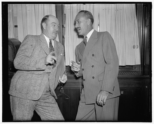 Members of new Air Safety Board. Washington, D.C., Aug. 22. Col. Sumpter Smith (left) and Thomas O. Hardin, members of the new Air Safety Board, Civil Aeronautics Authority, went into a huddle immediately after being administered the Oath of Office today, 8/22/38