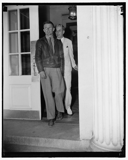 "Wrong Way" Corrigan calls on President. Washington, D.C., Aug. 31. "Wrong Way" Corrigan, who paid Washington a surprise visit today, is shown leaving the White House after being presented to President Roosevelt. He is shown with Oswald Ryan, member of the Civil Aeronautics Authority, who introduced