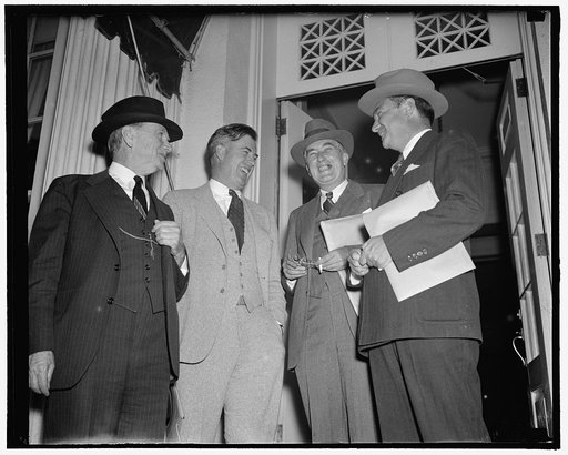 Roosevelt calls cabinet meeting. Washington, D.C., Sept. 16. Apparently not perturbed by President's Roosevelt's special cabinet meeting, were these four members of the cabinet who attended the meeting, left to right, Daniel Roper, Sec. of Commerce; Henry Wallace, Sec. of Agriculture; Charles Edison