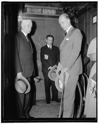 President receives latest reports on international situation. Washington, D.C., Sept. 27. Secretary Cordell Hull and Undersecretary of State Sumner Welles arriving at the White House today with latest reports on the critical international situation. Both officials have spent much time with the Chief