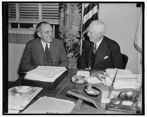 Red Cross offered air aid in forthcoming rill call. Washington, D.C., Oct. 6. Neville Miller, (left) President of the Association of Broadcasters, calling on Norman H. Davis, Chairman of the American Red Cross, to offer the fullest cooperation of his organization in the forthcoming nation-wide roll 