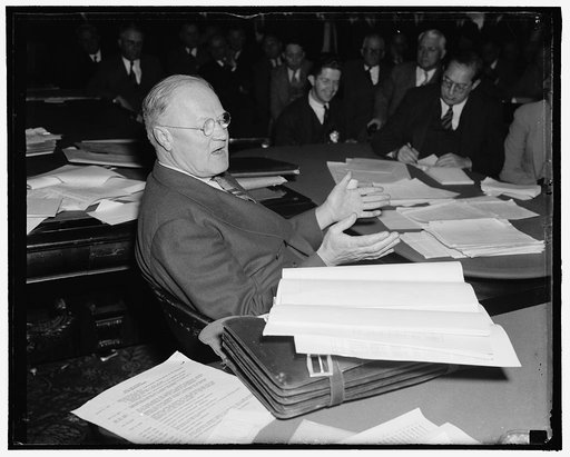 Appears before Roosevelt fact finding committee. Washington, D.C., Oct. 7. H.A. Enoch's, Chairman of the Carrier's Joint Conference Committee, today traced the history of collective bargaining of rail unions with the carriers. He asserted that since the 15 percent wage reduction notice was served on