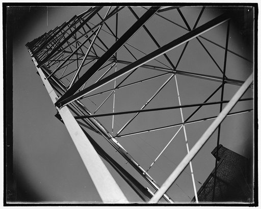 Looking up at the antenna mast in the rear of the precinct station. Washington, D.C., Oct. 29. WPDW, the radio station operated by the Metropolitan Police Department here is considered one of the most efficient and best equipped in the country. Located at No. 10 precinct, it was designed and built b