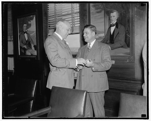 Perfect Harmony Washington, D.C., Nov. 7. Perfect harmony prevailed today as President Roosevelt's Special Committee of Rail Labor and Management representatives discussed proposed recommendations for legislative aid for the industry. Here we see George Harrison, right, President of the Brotherhood 
