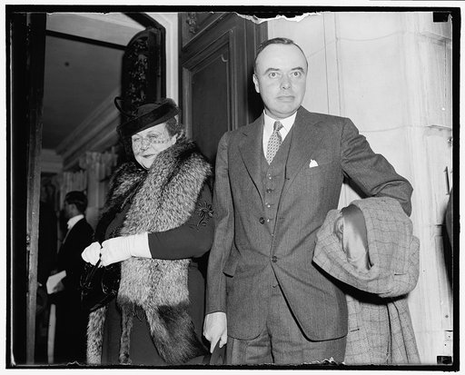 Attend Soviet party Washington, D.C., Nov. 7. Wage-Hour Administrator and Mrs. Elmer Andrews as they arrive to attend the party at Soviet Embassy today which marked the 21st anniversary of the October Socialist Revolution